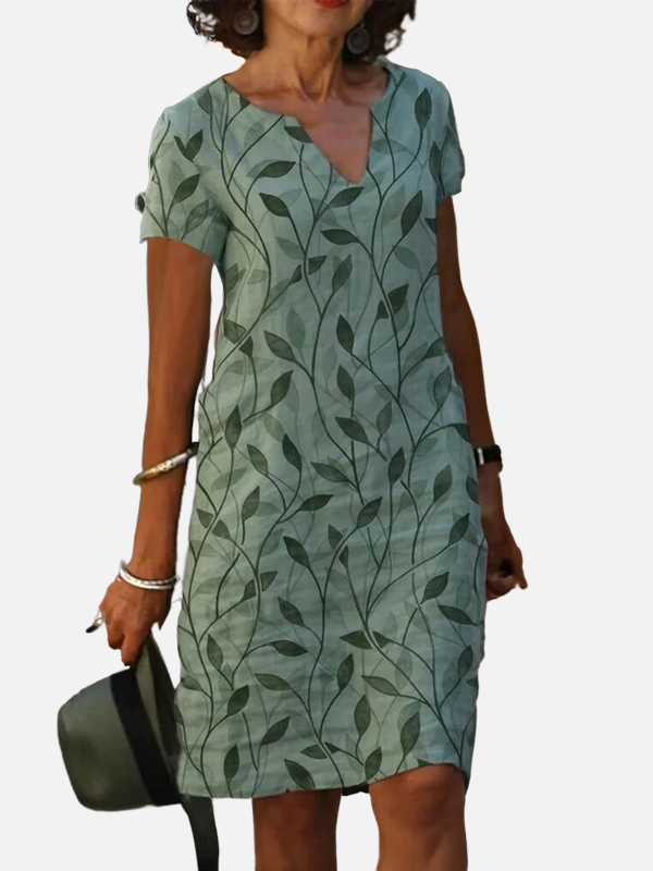 Sara | Midi-Jurk met Bladprint en V-Hals