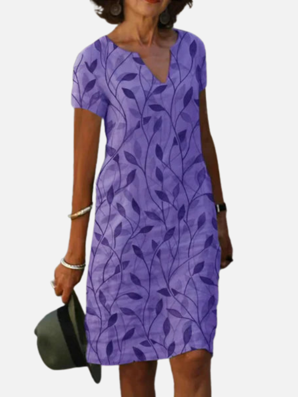 Sara | Midi-Jurk met Bladprint en V-Hals