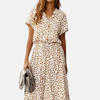 Sara | Gestippelde Midi Blousejurk