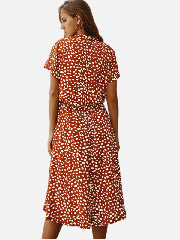 Sara | Gestippelde Midi Blousejurk